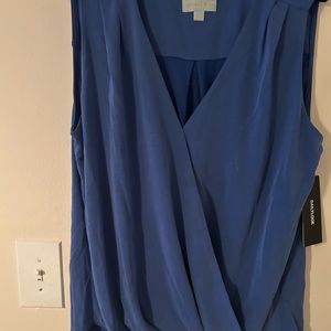 Blue short no sleeves, waist length